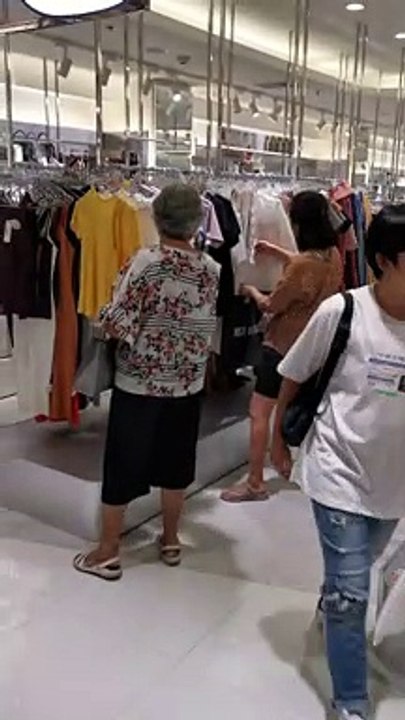 Lady selecting clothes