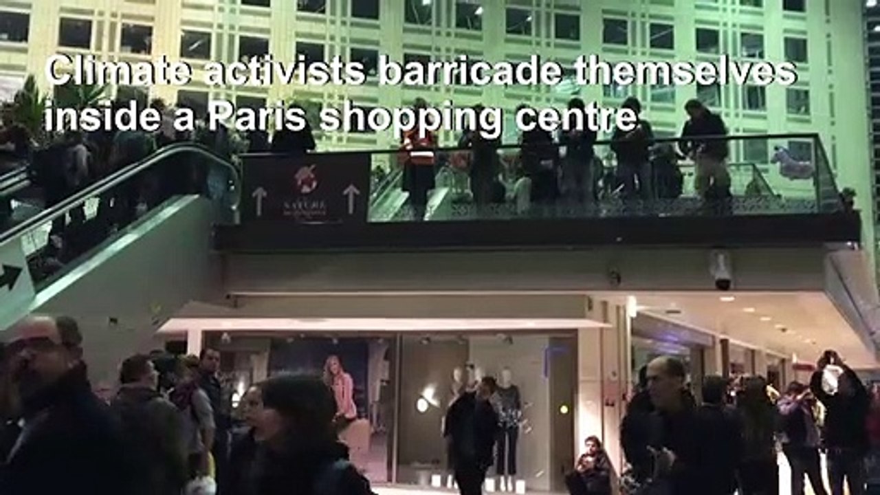 Climate activists occupy Paris mall