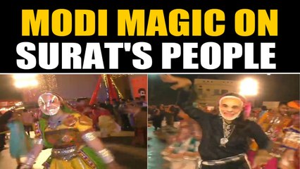 People Don Modi masks to perform garba in surat, video goes viral | OneIndia News