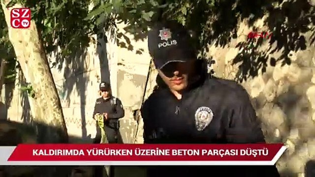 Kaldırımda yürürken üzerine beton parçası düştü