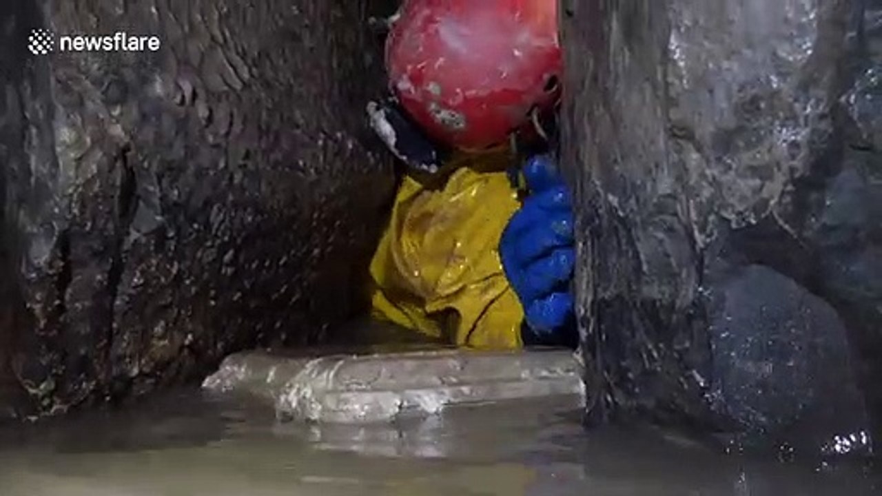 Stuck between a rock and a hard place? UK caver gets through tight gap