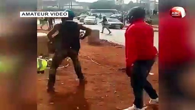 Nairobi residents scramble for free beer after a truck ferrying them overturned