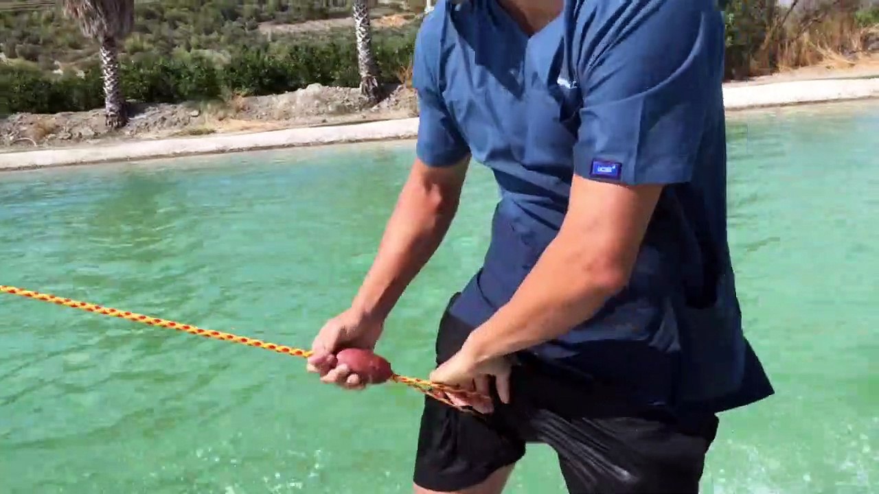 Doctor Brushes Teeth while Riding Wave with his...