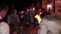 Il s'amusent à se mettre le feu aux cheveux avec de l’alcool lors d’un mariage