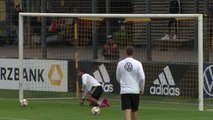 Gnabry has a go in goal during Germany training