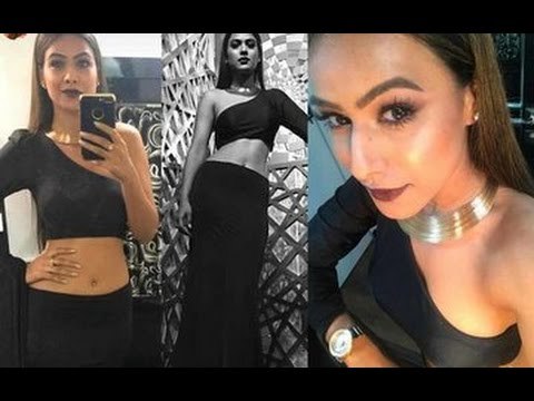 Nia Sharma Looks Sizzling Hot in her upcoming web-series 'Twisted' | TV | SpotboyE