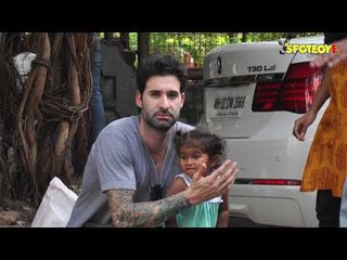 SPPOTTED: Sunny Leone's Husband Daniel with Daughter Nisha | SpotboyE