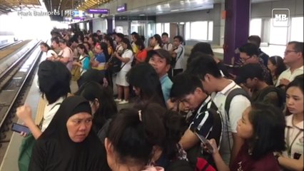 Passengers of the LRT-2 pile up at the Cubao Station in Quezon City