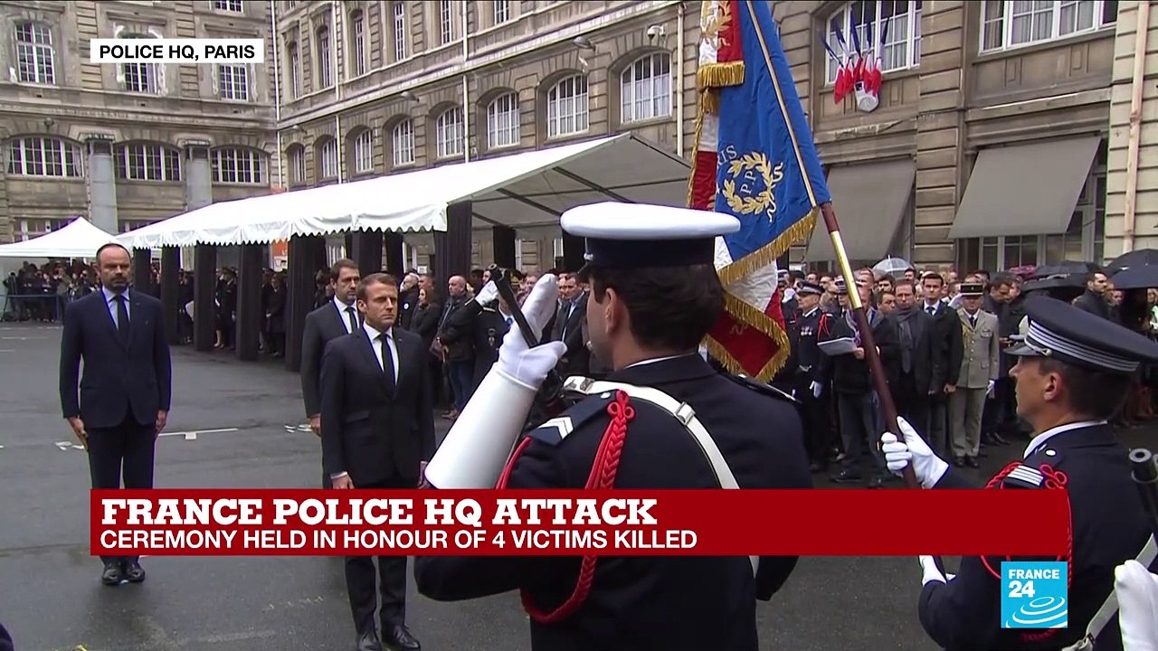 France: French president Emmanuel Macron enters police HQ and pays homage to the victims