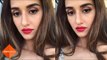 Disha Patani wards off our Monday blues in a red lip and silver dress as she clicks a selfie
