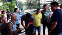 Motorcyclist snatches tourist's bag when he drinks coffee in Thailand