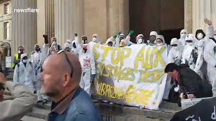 French activists drop 'contaminated' water vials to protest American chemical plant following fire