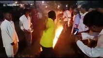 Worshippers run through burning trench for Hindu festival