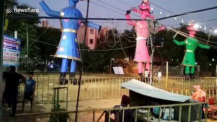 Devotees in India ignite massive 50 foot effigy to launch Dussehra festival