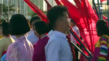 North Koreans celebrate Kim Jong Il anniversary