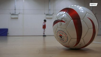 Nine-year-old Londoner Mikey lost eyesight but never lost passion for football