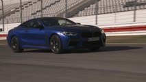 The new BMW M8 Coupé Driving on the Racetrack