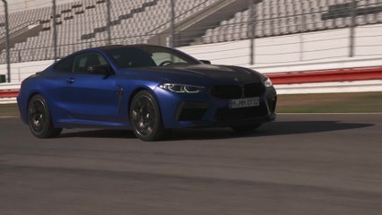 The new BMW M8 Coupé Driving on the Racetrack