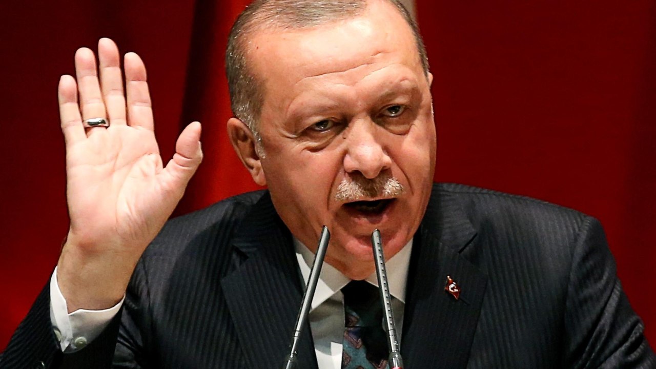 Turkey says it will not stop offensive as US threatens sanctions
