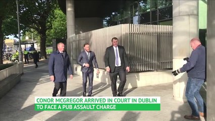 Connor McGregor arrives at court to face pub assault charge