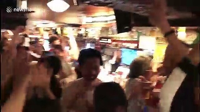 Pub in Osaka goes wild as Japan beat Scotland to claim place in quarter-finals