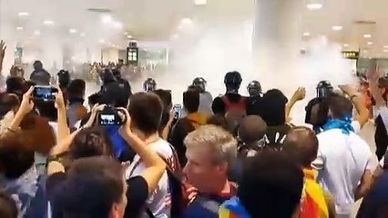 Flights cancelled as pro-separatist protesters clash with police at Barcelona airport
