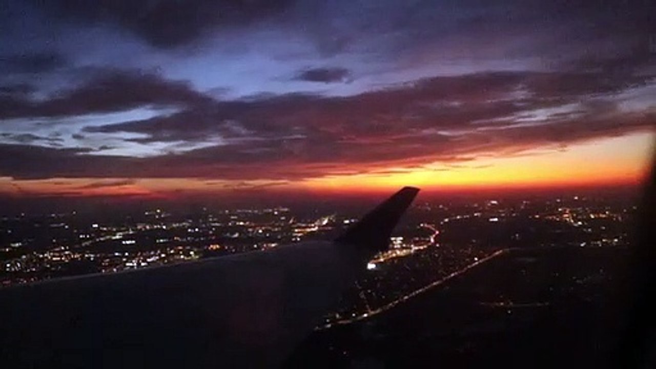 Sunset over Chicago during takeoff from Chicago O'Hare Airport