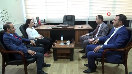 MHP'den saldırıya uğrayan İHA muhabirine üstün cesaret plaketi