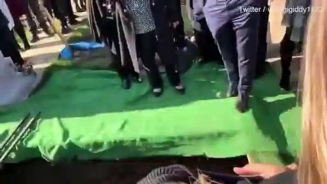 Mourners laugh when pre-recorded message is played from the coffin