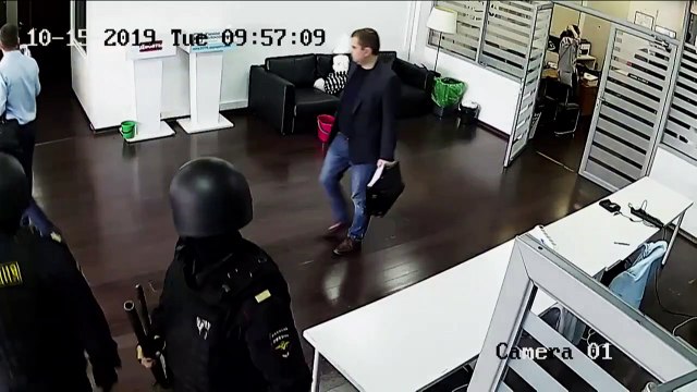 Russian investigators raid opposition's offices across country