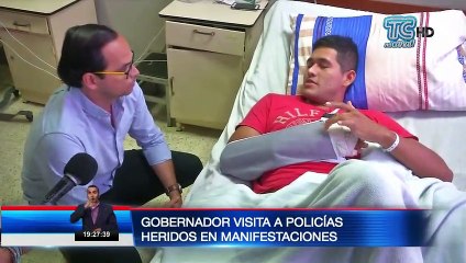 Gobernador visita a policías malheridos en manifestaciones