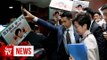 Hong Kong policy address halted after heckling