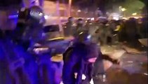 At least four detained as police clash with Catalan separatist supporters in Barcelona