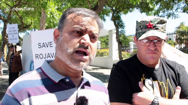 Kurdish Human rights group protest Turkish invasion of northern Syria outside parliament in Cape Town