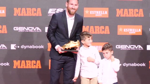 Thiago and Matteo Messi help their Dad collect his sixth Golden Boot