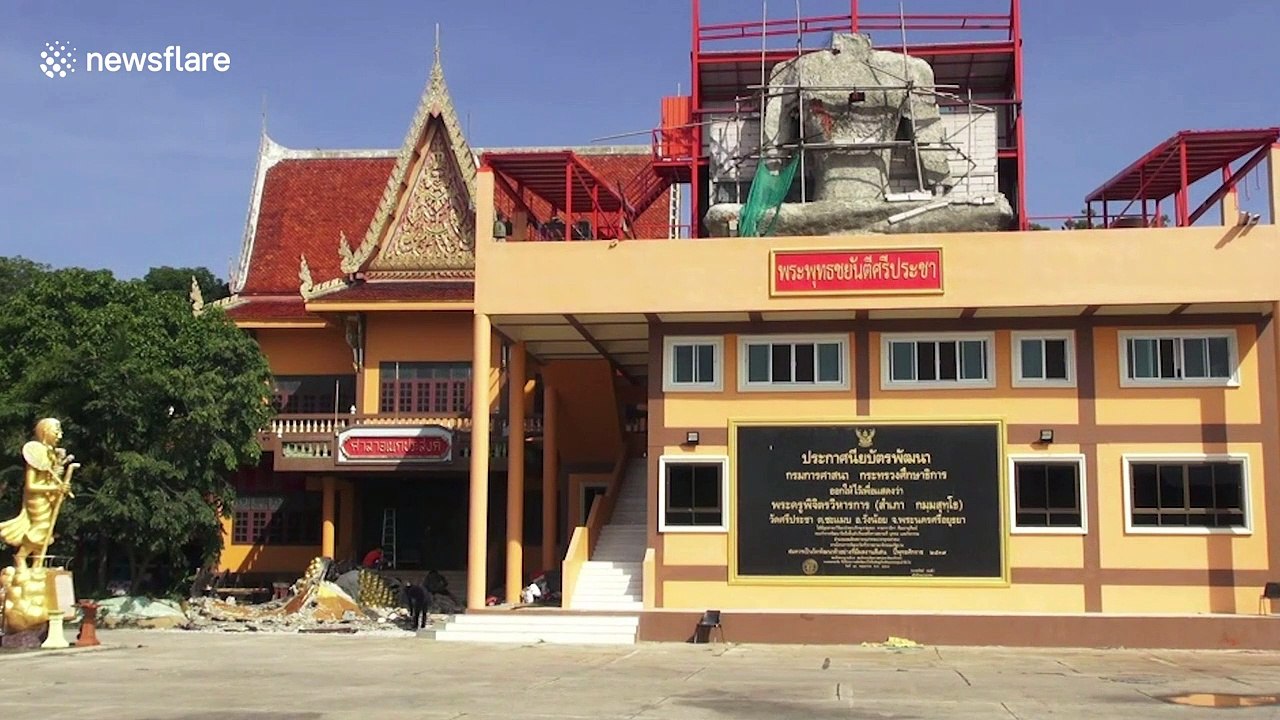 Dramatic moment 16ft-high 'lucky' Buddha statue drops from crane and smashes into the ground