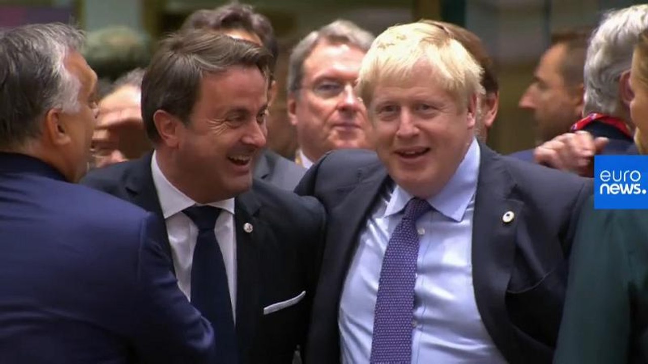 Watch: Hearty handshakes as Boris Johnson toasts Brexit deal with EU leaders