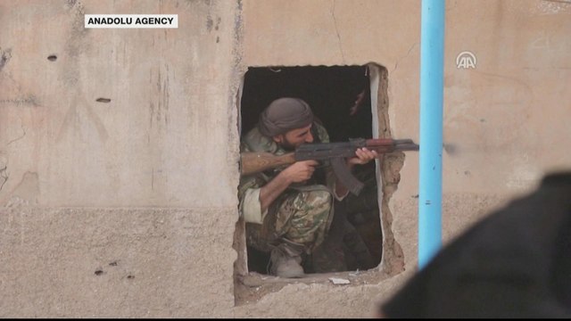 Turkey-backed Syrian fighters seek control of key border town