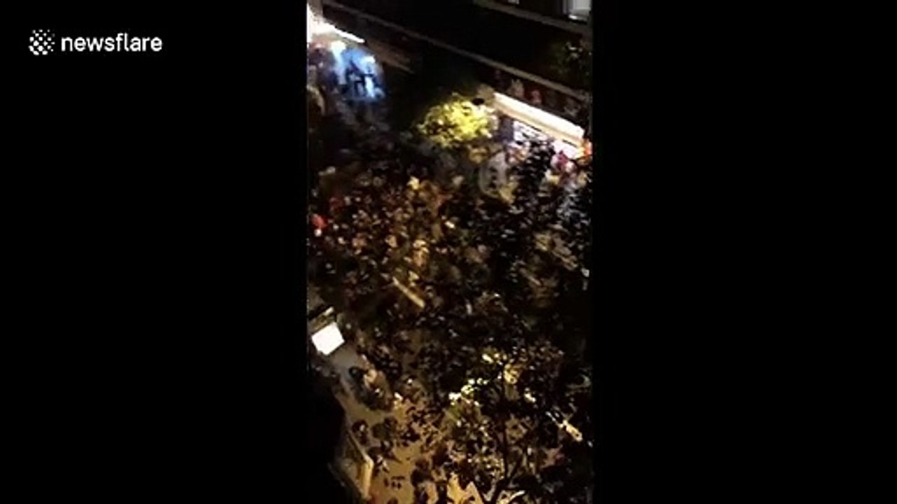 Hundreds of protesters shout "Barcelona anti-fascist" as they march through the streets of Barcelona