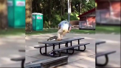 Guy With Scooter Fails While Jumping Over A Table