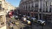 Large police presence as Extinction Rebellion block Oxford Circus with massive wooden structures