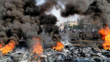 Amid protests, Lebanon's Hariri sets deadline to resolve crisis