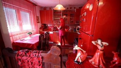 Lady in red: Bosnian has kept to the same colour all her adult life