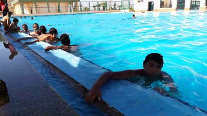 Boys Enjoys Summer In Pool