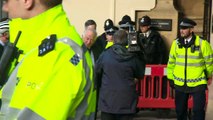 Gove and Rees-Mogg escorted by police through protests