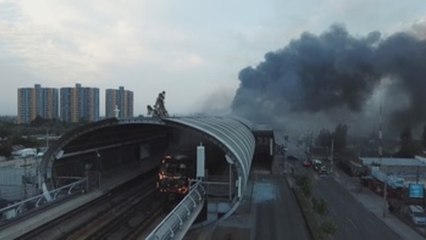 Tres muertos en el incendio de un supermercado durante disturbios en Santiago