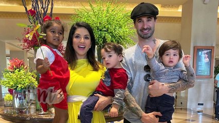 Sunny Leone shares a passionate kiss with hubby and birthday boy Daniel Weber!