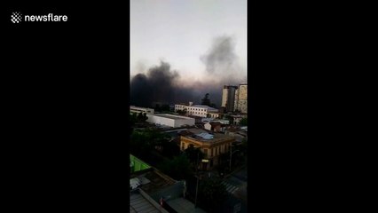 Plume of smoke seen rising over Chile's capital as violent protests continue