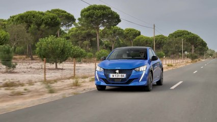 The new Peugeot e-208 GT in Vertigo Blue Driving Video
