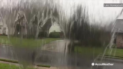 Heavy rain spills over gutters